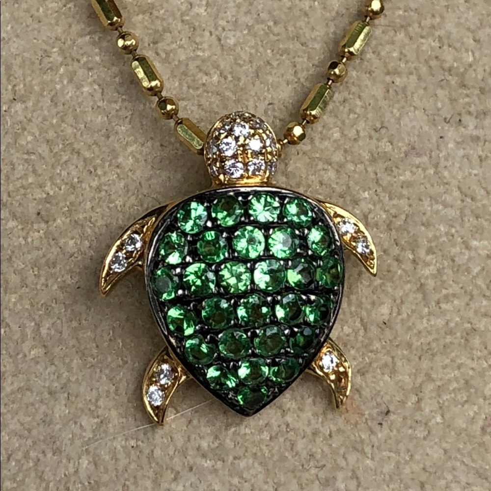 SOLD 18kt Gold Turtle Pendant w/ green garnet and Dias.
